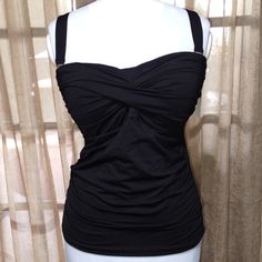 Brand Nwt Black Tankini Swim Top. Plus Size 16w. Retail $72.00. Brand: Anne Cole. Padded Chest Area. Adjustable Straps. Gathered On The Sides At The Bottom Of The Tankini Top. Smoke Free/Pet Free Home. Sellers' Notes: P.M.E. Bin #1. Inv. 305. Black Ruched Top For Formal Occasions, Elegant Fitted Lined Top, Black Tankini, Black Plus Size, Tankini Swim Tops, Top Plus Size, Tankini Top, Swim Top, Womens Swim