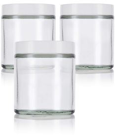 three clear glass jars with no lids