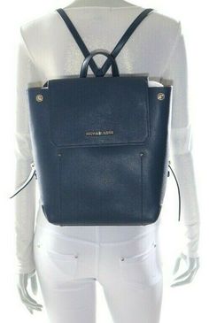 Details: Michael Kors Hayes Medium Backpack Navy/ Dark Khaki NWT348.00 STYLE: 35F8GYEB2M Hayes Color: variety of colors (please check stocks) Material: made with 100% Leather (exterior) Dimensions: 10” Width x 12” Height x 4.5” Depth Interior: 2 slip pockets Exterior: external back slip pocket Brand’s Logo: “Michael Kors” logo on flap closure Silver hardware with lock charm Bag Closure: magnetic snaps with side snaps Top Handle: 2.25” Bag Straps: adjustable straps Model Mannequin Life Size Detai Classic Rectangular Backpack For Shopping, Designer Leather Backpack With Branded Hardware, Designer Leather Backpack For Shopping, Michael Kors Leather Standard Backpack, Designer Backpack With Gold-tone Hardware, Leather Backpack With Branded Hardware For Daily Use, Luxury Leather Backpack With Branded Hardware For Everyday, Modern Leather Backpack With Gold-tone Hardware, Designer Leather Backpack With Gold-tone Hardware