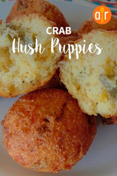 crab hush puppies on a plate with the words crab hush puppies above them