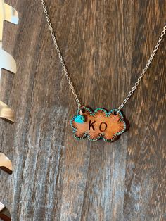 Tooled leather initial necklace with turquoise-personalized gift for her-Christmas-tan brown-native southwestern-boholeathercraft #BarNecklace #MonogrammedNecklace #IdNecklace #InitialNecklace #LeatherNecklace #CustomGift #GiftForHer #StampedLeather #CustomNecklace #WesternNecklace Leather Bar Necklace, Southwestern Engraved Necklaces For Gifts, Southwestern Engraved Necklace For Gift, Adjustable Brown Laser Engraved Jewelry, Artisan Stamped Brown Jewelry, Turquoise Hand Tooled Jewelry Gift, Hand Stamped Brown Jewelry For Gifts, Southwestern Style Hand Tooled Necklace As Gift, Hand Stamped Brown Jewelry As A Gift