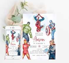 the avengers birthday party is set up next to an iphone