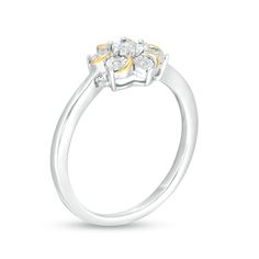 Eye-catching and unique, this diamond flower ring is certain to delight. Created in sterling silver and 14K gold plate, this style showcases a flower-shaped arrangement of diamonds - each artfully set to enhance size and sparkle. Curved gold-plated ribbons lend charming visual interest to the look. Captivating with 1/20 ct. t.w. of diamonds and a brilliant buffed luster, this design is a sweet anytime treat. Custom-made to fit her ring size. Sterling silver rings cannot be resized after purchase. Diamond White Flower Ring Fine Jewelry, Anniversary Flower Diamond Ring With Prong Setting, Fine Jewelry Flower Ring With Prong Setting For Anniversary, Cluster Flower Promise Ring In Fine Jewelry, Yellow Gold Flower-shaped Ring With Diamond Accents, Anniversary Flower Diamond Ring With Halo Setting, Fine Jewelry Diamond White Flower Shaped Rings, White Gold Flower Shape Diamond Ring With Prong Setting, Flower Shaped Rings With Diamond Accents For Anniversary