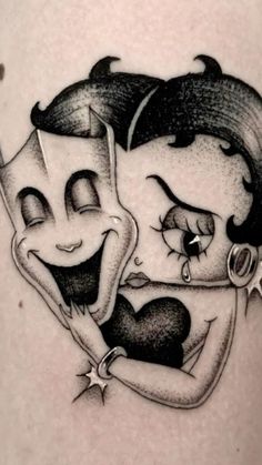 a tattoo with two people hugging each other