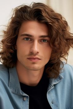 Long hair with gentle curls is a beautiful and romantic long hairstyle that complements men with naturally curly or wavy hair. To enhance these curls using a light hold product or styling foam can be helpful. Click here to check out more irresistible long hairstyles for men. Boyfriend Hair, Layered Curly Hair, Mens Cuts, Curly Hair Men