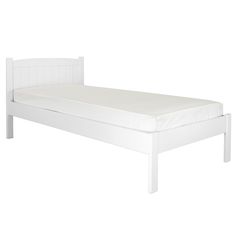 a white bed frame with no sheets on it