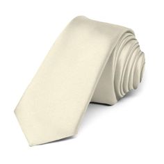 This ivory premium tie is cut in our skinniest and trendiest 2-inch width. Its heavyweight woven material and smooth satin finish provides a sharp look that is suited for your most formal occasions.We recommend this shade for a light, off-white color. Product Features • Skinny 2" width, at the widest point • 57" length, tip to tip• Color is ivory • Made from 100% Polyester Microfiber • Smooth, satin finish • Imported Wedding Suit And Tie Accessories With Satin Finish, Elegant Adjustable Solid Ties, Classic Wedding Ties With Satin Finish, Elegant Cream Standard Tie, Classic Adjustable Tie For Groom, Classic Adjustable Ties For Groom, Classic Adjustable Satin Ties, Classic Beige Ties, Classic Solid Satin Tie