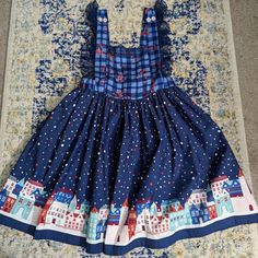 Wildflower Winter Wonderland Holiday Pinafore Size 14 Dress Blue Dress For Christmas Holiday, Blue Christmas Holiday Dress, Holiday Blue Ruffled Dress, Blue Holiday Dress With Ruffles, Blue Ruffled Dress For Holiday, Blue Holiday Dresses With Ruffles, Cute Blue Holiday Dress, Blue Floral Print Dress For Holiday, Blue Floral Print Dresses For Holiday