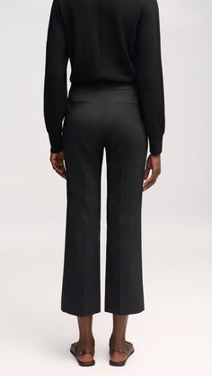 Made of seasonless Italian wool, this versatile pant fits slim through the thigh with a subtle flare and ankle length inseam. Functional details include an exterior credit card pocket, side pockets, and back welt pockets. Pairs well with the Piped Blazer or a casual top. Straight Silhouette Dress Pants With Belt Loops For Office, Black Bottoms With Pressed Crease, Elegant Bottoms With Welt Pockets And Straight Silhouette, Formal Dress Pants With Belt Loops, Sleek Straight Silhouette Bottoms For Evening, Business Casual Pants With Belt Loops And Straight Silhouette, Black Bottoms With Welt Pockets Straight Silhouette, Black Bottoms With Welt Pockets And Straight Silhouette, Formal Straight Silhouette Pants With Belt Loops