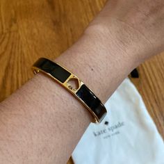 Brand New, Kate Spade Hinged Bracelet. Black And Gold. Comes With Dust Bag. Trendy Kate Spade Bracelet, Kate Spade Elegant Black Jewelry, Elegant Black Kate Spade Jewelry, Elegant Everyday Jewelry With Black Band, Elegant Bracelets With Black Band, Kate Spade Bracelet, Kate Spade Bangle, Knot Bangle, Geometric Bracelet