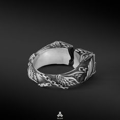 CRAFTED TO IMPRESS Every piece is CRAFTED to last; quality is the soul of the brand. Experience the art of handcrafted men's silver jewelry. Each piece is meticulously crafted, from casting to polishing, ensuring perfect finishing. Elevate your jewelry experience with our distinctive rings, where craftsmanship meets excellence. PRECISION AND PERFECTION Our rings are crafted from S925 silver, and then meticulously hand-finished to achieve perfection.Stylish, classic, and understated designs, perf Unique Silver Engraved Ring With Oxidized Finish, Engraved Sterling Silver Brutalist Jewelry, Symbolic Hand Cast Silver Engraved Ring, Brutalist Silver Engraved Rings, Brutalist Open Ring With Oxidized Finish, Brutalist Oxidized Open Ring Jewelry, Artisan Hand Cast Silver Rings, Symbolic Silver Ring With Hand Cast Details, Silver Engraved Metal Signet Ring