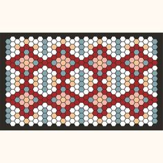 the pattern is made up of hexagons and circles in red, white, blue, and black