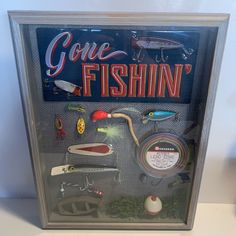 a display case with fishing related items in it