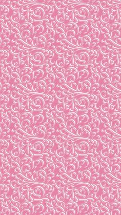 a pink background with white swirls on it