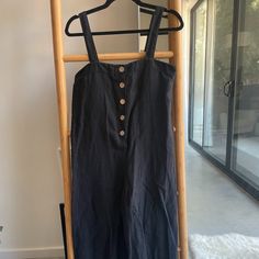 Black Zara Linen Jumpsuit In Size S. Never Worn. Slightly Oversized. Faux Buttons In Front. In Excellent Condition. Black Summer Jumpsuit With Button Closure, Zara Black Jumpsuits And Rompers For Summer, Chic Black Jumpsuits And Rompers With Buttons, Black Overalls With Buttons, Black Overalls And Rompers With Buttons, Black Jumpsuits And Rompers With Buttons, Linen Jumpsuit, Zara Pants, Black Jumpsuit