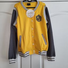 Brand New With Tag! Has Somehow A Very Small Dot On The Left Back Side (Barely Noticable - Please See Pictures) Harry Potter Hufflepuff, Bomber Jackets, Red Jacket, Warner Bros, Varsity Jacket, Harry Potter, Jackets & Coats, Jackets For Women, Yellow