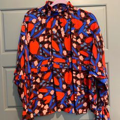 Nwot Karlie Dressy Blouse. Beautiful Colors. Never Worn. No Tag To Indicate Size But Is A Size Small. Runs A Little Big. Ruffle Around Middle. Scrunchy Design Around Neck And Wrist. Red Blouse With Vibrant Print For Fall, Blue Blouse With Vibrant Print For Fall, Chic Blue Blouse With Vibrant Print, Dressy Blouse, Red Skirts, Deep Red, Red Blue, Beautiful Colors, Red And Blue