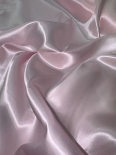 Baby pink satin fabric Add a delicate touch to your apparel, curtains, bedding, costumes, and crafts with this sun yellow satin fabric. Its light fabric weight and solid/plain pattern make it a versatile choice for any project. Measuring 58 inches wide, this fabric is perfect for draperies, cushions, and everyday clothing. The exact colour of the fabric is baby pink, making it an ideal choice for weddings, decorations and bridal wear. Use this fabric for draping and create a soft, romantic atmosphere. This satin fabric is an excellent choice for any DIY project. Delivery All items are dispatched within 1-2 working days. All items are sent with royal mail 1st class post Item will be sent within 1 day of cleared payment I accept returns within 30 days of purchase Return postage will be occur Pale Pink Fabric, Baby Pink Aesthetic Vintage, Clothing Fabric Patterns, Satin Curtains, Baby Pink Satin, Pink Satin Fabric, Baby Pink Color, Pink Satin Dress, Baby Rosa