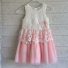 Little Girls Formal Dress For Special Occasion. Colors Are Cream And Peach. Skirt Has Multiple Layers To Make Fluffy. Dress Is New With Tags Sleeveless Princess Dress With Lace Trim, Spring White Princess Dress With Lace Trim, White A-line Princess Dress For Spring, White Sleeveless Princess Dress With Lace Trim, Sleeveless White Princess Dress With Lace Trim, White Princess Dress For Spring Dress-up, White Fitted Princess Dress For Spring, Spring Princess Dress With Lace Trim, White Princess Dress For Summer Dress-up