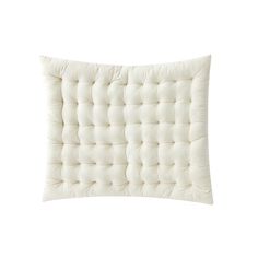 a white pillow on a white background