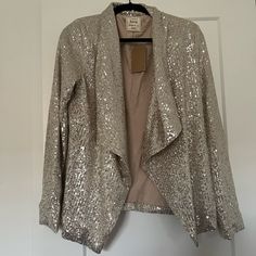 Champagne Colored Base Fully Lined Sequins Blazer- The Sequence Is Silver - Soooo Sparkly Metallic Sequined Outerwear For Formal Occasions, Metallic Sequined Outerwear For Formal Events, Elegant Metallic Outerwear With Sequins, Silver Long Sleeve Blazer For Night Out, Silver Sequined Outerwear For Fall, Elegant Metallic Sequined Outerwear, Chic Silver Blazer For Party, Fitted Silver Sequined Outerwear, Silver Blazer For Night Out In Fall