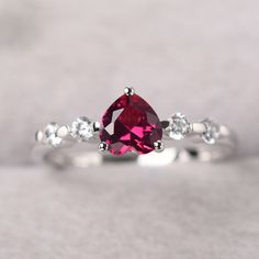 ◆ The ring is handcrafted from sterling silver and decorated with a dazzling 6*6 mm lab ruby and tiny CZs. It is suitable for engagement/anniversary/daily occasion. ◆ Production Description: Main stone Type: Lab ruby Main Stone Shape: Heart cut Main Stone Size: 6*6 mm(1.13 ct) Side stone: CZ Metal: 925 Sterling silver - Other options available in the drop down menu ◆ Customization: √Free for Add Engraving √Other Metal Type Available √Other Gemstones & Shapes Available √Personalization Reques Red Diamond Heart Ring For Anniversary, Ruby Ring With Diamonds For Valentine's Day Promise, Diamond Ruby Ring For Valentine's Day Promise, Red Heart Diamond Ring For Anniversary, Heart-shaped Diamond Ring For Anniversary, Classic Ruby Birthstone Ring For Valentine's Day, Red Heart Shaped Diamond Anniversary Ring, Ruby And Diamond Proposal Ring, Valentine's Day Promise Ruby Ring With Diamonds