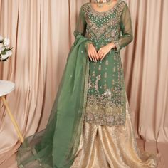 3 Piece Suit: Green Organza Shirt With Heavy Embellishment Work (Zardozi, Raysham, Etc) + Inner Gold Tone Sharara Organza Dupatta Size: Sewn To Standard Sizing, May Need Altering To Fit You Better Ordered As An L, Probably A Us8/10 New & Never Worn Green Indian Suit, Green Pakistani Suit, Green Lehenga Choli, Pakistani Lehenga, Net Shirt, Gold Lehenga, Indian Suit, Red Bridal Dress, Luxury Pret