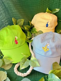 FAST SHIPPING! We guarantee your order will ship within 5 days! **Delivery time is dependent on region and local Postal Services.** Inspired by the game these cuties are named for. These caps are customizable, choose the color of your cap with your choice of Pikmin! Hat is unisex sized, cotton, and features an adjustable strap. Hat size: 6 5/8 - 7 3/8 **If you have any questions on choosing the hat and pikmin combo you want, please send us a message. We are always happy to help Pikmin Embroidery, Casual Curved Brim Baseball Cap For Playtime, Casual Curved Brim Baseball Cap, Playful Adjustable Cotton Baseball Cap, Casual Hats For Playtime, One Size Fits Most, Casual Snapback Hats For Playtime, Adjustable Curved Brim Fun Dad Hat, Novelty Cotton Baseball Cap One Size Fits Most, Novelty Cotton Baseball Cap One Size