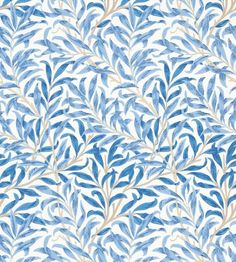 a blue and white wallpaper with leaves on it