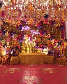 a decorated stage with flowers and candles