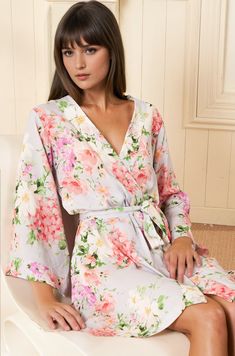 This elegant floral robe showcases an exclusive, romantic print on luxuriously soft, high-quality rayon. Meticulously designed for versatile wear, it’s the perfect addition to any woman's wardrobe. Whether used as a bridesmaid or bridal robe, a maternity robe, or as a stylish pool or beach cover-up, this robe is a one-of-a-kind keepsake. FABRIC: 100% Rayon LENGTH: Top of shoulder to hem 36" STYLE: PJ-18088 in SOFT KISS BLUE - SOBLU-P99 *Model is wearing size small *Machine was on cold, and hang Bridesmaid Robes Floral, Dream Lover, Lounge Looks, Floral Bridesmaid, Bridal Robe, Yumi Kim, Floral Robes, Daytime Dresses, Bridesmaid Robes