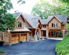 a large house with lots of wood and stone