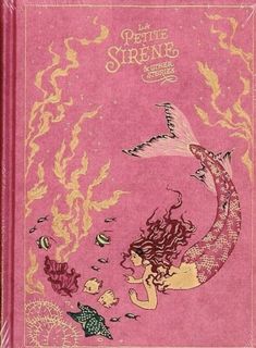 a pink book with an image of a mermaid and fish on it's cover