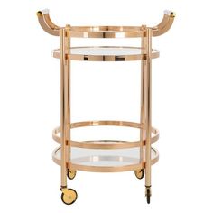 a gold bar cart with two glass shelves on each side and wheels, all in the same color