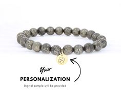 "Are you looking for a beaded bracelet that not only looks amazing but carries a powerful meaning as well? Then this pyrite bracelet is the perfect pick for you! Not only does this personalized bracelet have great aesthetic appeal but its wearing this genuine pyrite protection bracelet helps to create a powerful shield from all the negative energy around. Each or our beaded bracelets come with its attached charm that you can have custom engraved with any personalization of your choice - a name, a saying, or an important date. This way this personalized jewelry piece can easily transform into something special, unique and perfect just for you. ⚜️ PERSONALIZATION INSTRUCTIONS ⚜️   After you place your order for your personalized jewelry piece, we'll send you a message with a digital preview Pyrite Bracelet, Personalized Watches, Personalized Bracelet, Bracelet Crystal, Fool Gold, Protection Bracelet, Chakra Bracelet, Engraved Bracelet, Bracelet Beaded