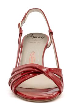 Slender straps crisscross over the vamp of a slingback leather sandal grounded by a cushioned footbed and architectural heel. 2 1/2" heel Adjustable slingback strap with buckle closure Memory foam cushioning Leather upper and lining/leather and rubber sole Made in Italy Slingback Sandal, The Vamps, Sandal Women, Amalfi, Criss Cross, Leather Sandals, Memory Foam, Rubber Sole, Womens Sandals