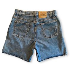 Vintage Levi's shorts. No stretch! Size 14 but fits closer to a 12. flat measured waist is 16 inches. Hips flat measured at 19 inches. Total length of shorts is 18 inches. Classic Jean Shorts With Belt Loops, Vintage Knee-length Shorts With Pockets, Vintage Cotton Bermuda Shorts, Retro Jean Shorts With Pockets, Vintage Bermuda Bottoms With Pockets, Vintage Relaxed Fit Shorts With Pockets, Vintage Shorts With Belt Loops, Vintage Short Bottoms With Belt Loops, Classic High Waist Cotton Shorts