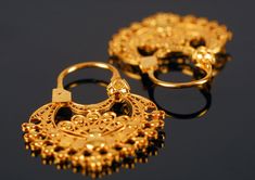 "The design of these beautiful Horseshoe earrings is inspired by models of \"fan\" or \"half moon\" earrings used by women in the 18th and 19th centuries, in the Salamanca region. The earrings are handmade with 18K gold and filigree technique. They're a light and delicate jewel and an ideal complement for any occasion. Features of this piece: Name: Horseshoe Earrings* Size: 32 X 24 mm Thickness: 4 mm Materials: 18K yellow gold Weight: 4.00 g Techniques: Filigree, handcrafted jewelry Finish: 24K Artisan Gold Hoop Earrings For Festivals, Festival Hoop Filigree Earrings, Artisan Pierced Earrings For Wedding, Elegant Pierced Hoop Earrings For Ceremonial Occasions, Elegant Hoop Earrings For Ceremonial Occasions, Elegant Ceremonial Hoop Earrings, Traditional Pierced Hoop Earrings For Wedding, Handmade Yellow Gold Hoop Earrings For Wedding, Intricate Small Hoop Earrings For Festivals