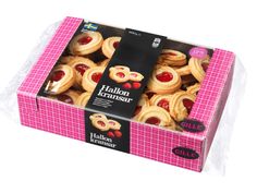 a pink box filled with cookies covered in jelly