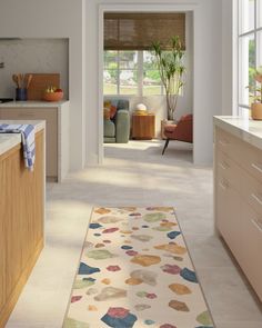 the kitchen is clean and ready to be used as a living room or dining area