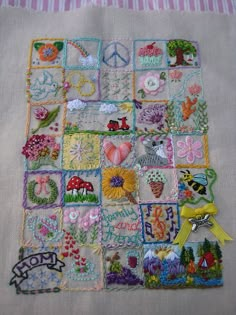 a patchwork quilt with many different designs on it