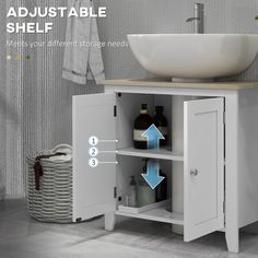 a bathroom sink and cabinet with measurements