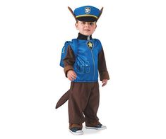 a little boy dressed up in a costume