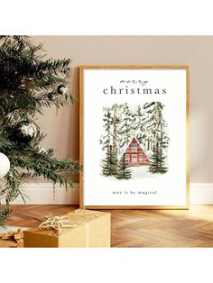 a christmas card with the words merry christmas on it next to a tree and presents