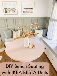 a table with flowers in a vase on it and the words diy bench seating with ikea besta units