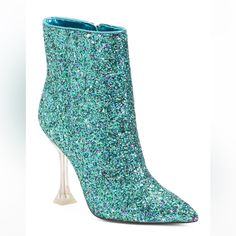 Nine West Color: Teal Sparkly Upper With A Clear Heel Style:Sparkle Dress Boots Glitter & A Clear Heel Size: Women’s Size 8 Medium Features: Glitter Embellishments 4” Heel Clear See Through Heel Pointy Toe Side Zipper New In The Box Smoke & Pet Free Home Shipping Daily: Monday - Friday Bundle Your Likes For A Private Offer Please Ask Questions Blue Heels For Fall Parties, Blue Heels For Fall Party, Blue Heels For Party And Fall Season, Blue Heels For Winter Party, Blue Party Heels For Winter, Winter Party Blue Heels, Blue Glitter Heels With Round Toe, Fitted High Heel Sequin Boots, Fitted High Heel Glitter Boots