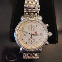 Round Pearl Face With Diamonds. Comes With 6 Extra Bands. Elegant Silver Diamond Chronograph Watch, Designer Silver Chronograph Watch For Formal Occasions, Silver Designer Chronograph Watch For Formal Occasions, Elegant Silver Chronograph Watch Accessories, Elegant Silver Chronograph Watch With Polished Finish, Elegant Silver Chronograph Watch, Silver Chronograph Watch For Formal Occasions, Elegant Diamond Chronograph Jewelry And Watches, Elegant Diamond Chronograph Watch For Formal Occasions