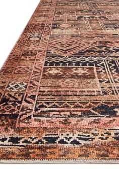 an area rug with various colors and patterns