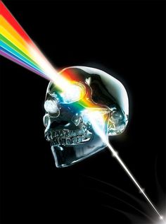 a skull with a rainbow colored light coming out of it's face and the image is