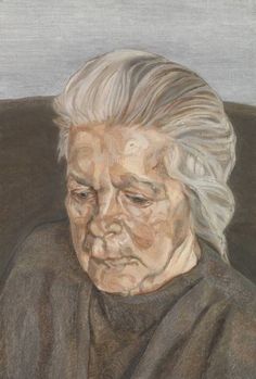 an old woman sitting in a chair with her eyes closed